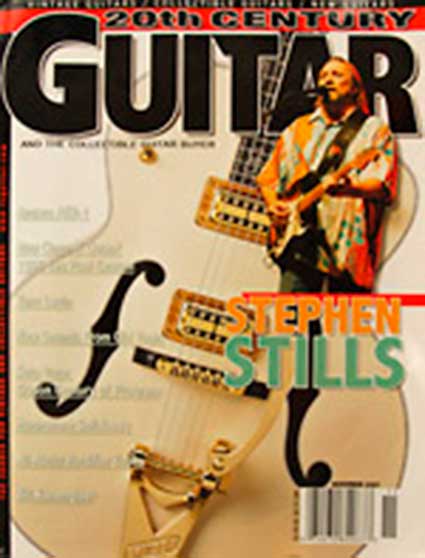 Magazine cover featuring a guitarist and guitars.