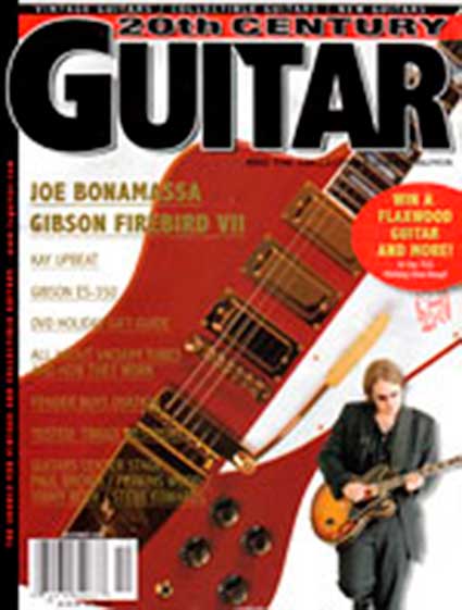 Magazine cover featuring guitarist with electric guitar.